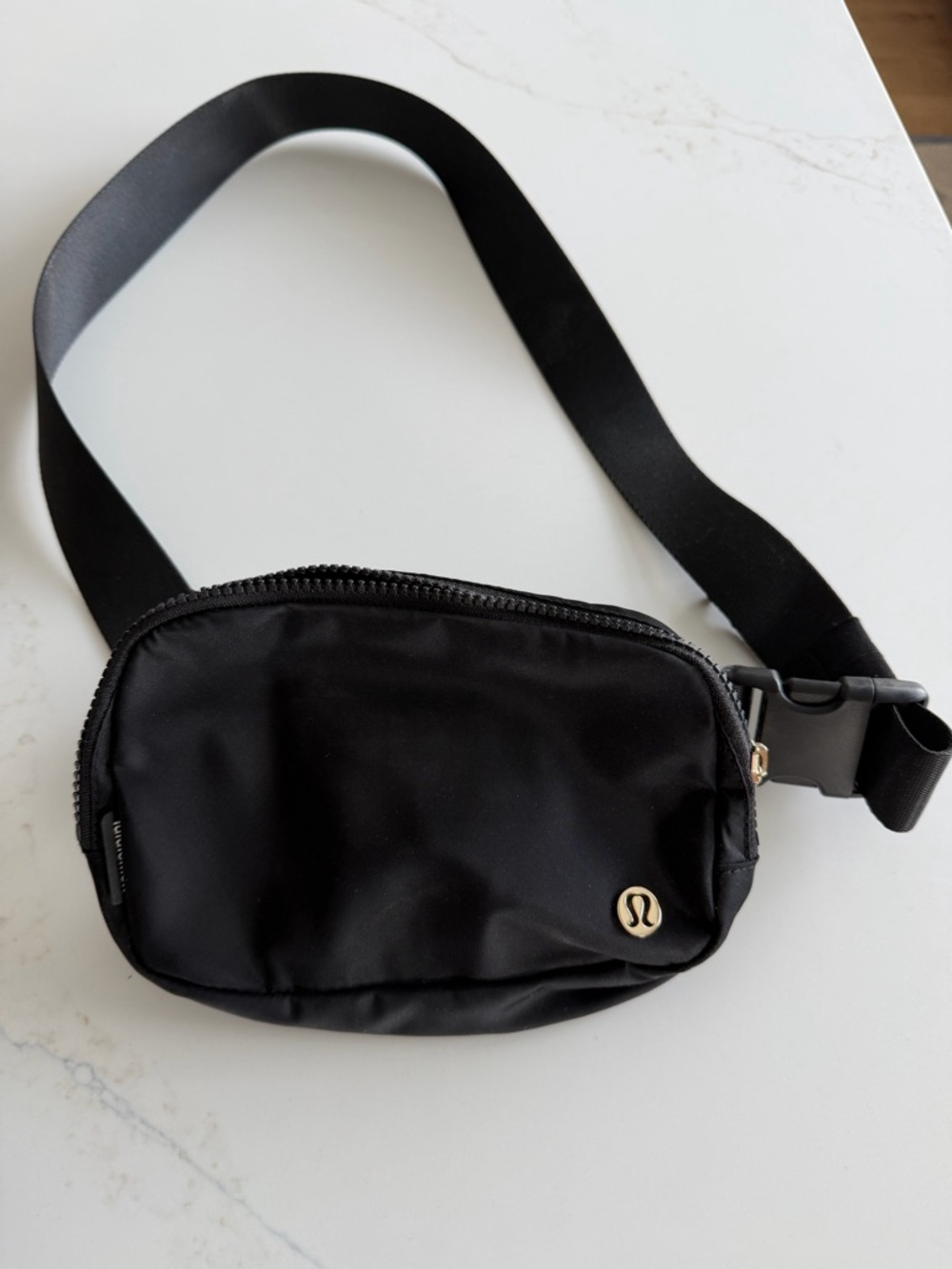 lululemon athletica Black  Waist Pack with GOLD logo and zipper - Like New